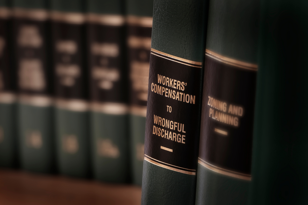 Workers compensation law books in a New York Attorney office