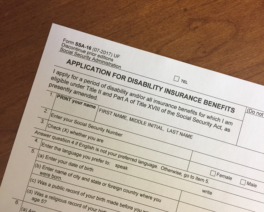 Social Security Disability Insurance application sitting on a desk.